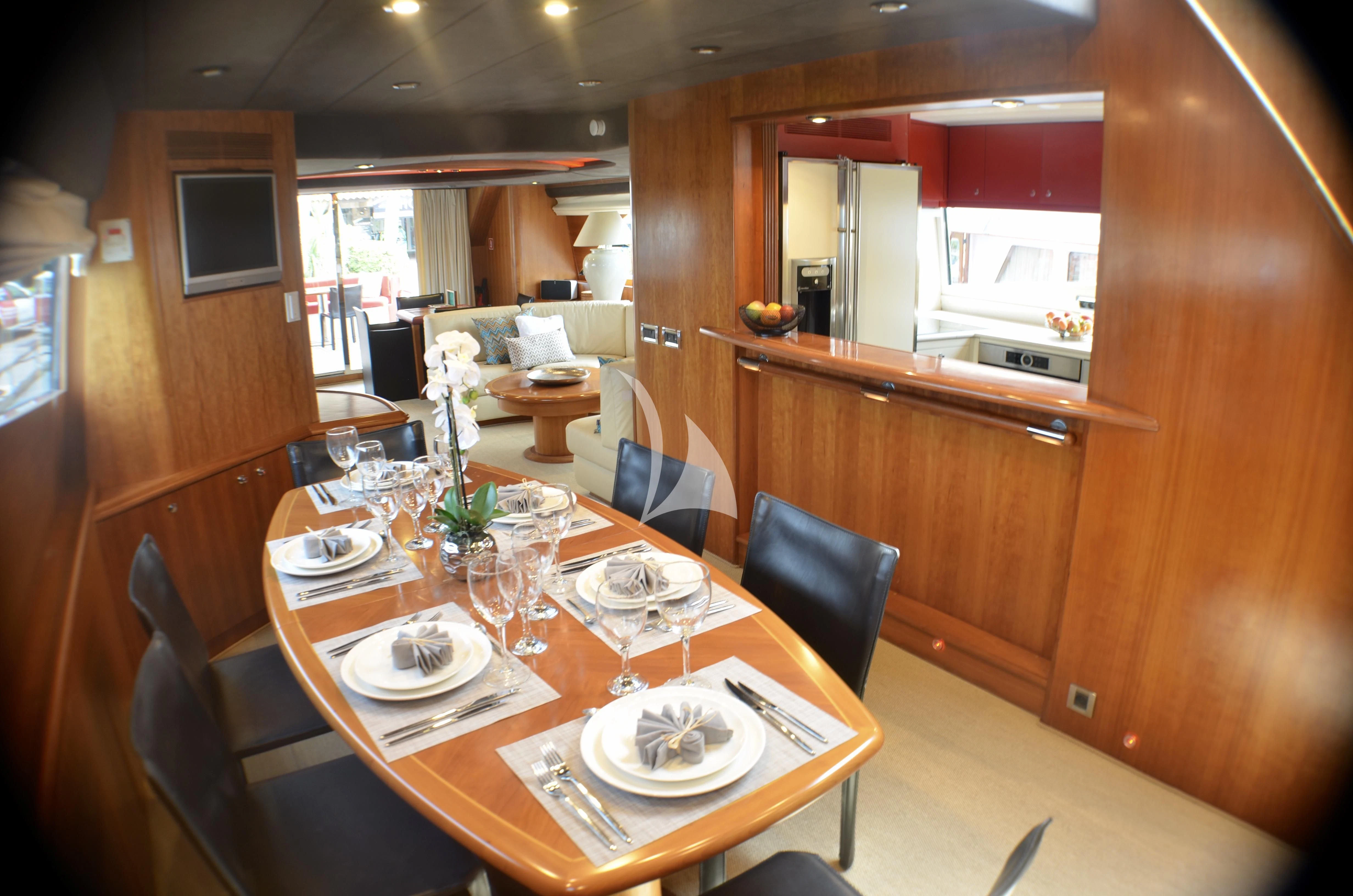 a dining table set for a dinner aboard FIGI Yacht for Sale