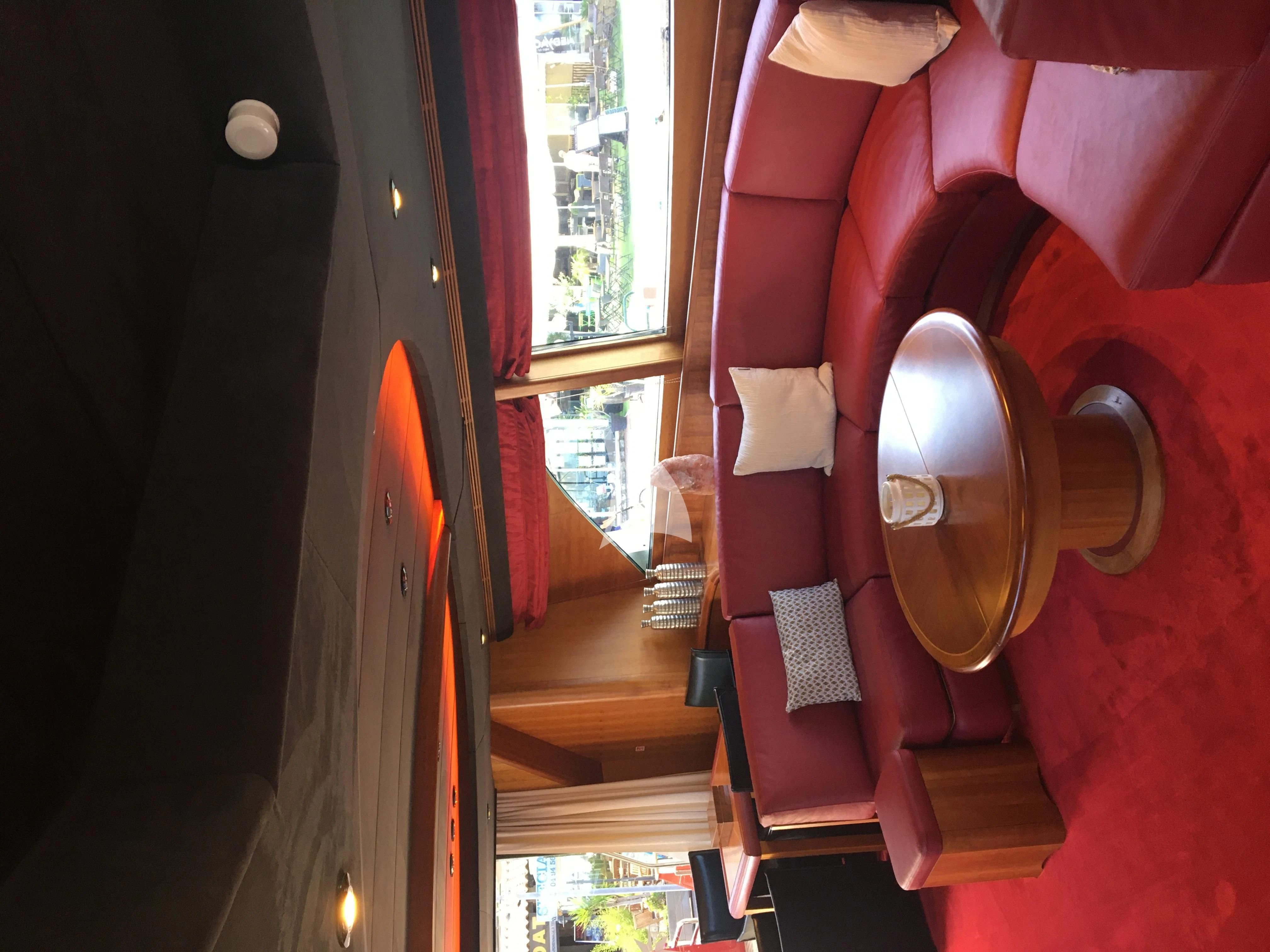 a red and white balloon aboard FIGI Yacht for Sale