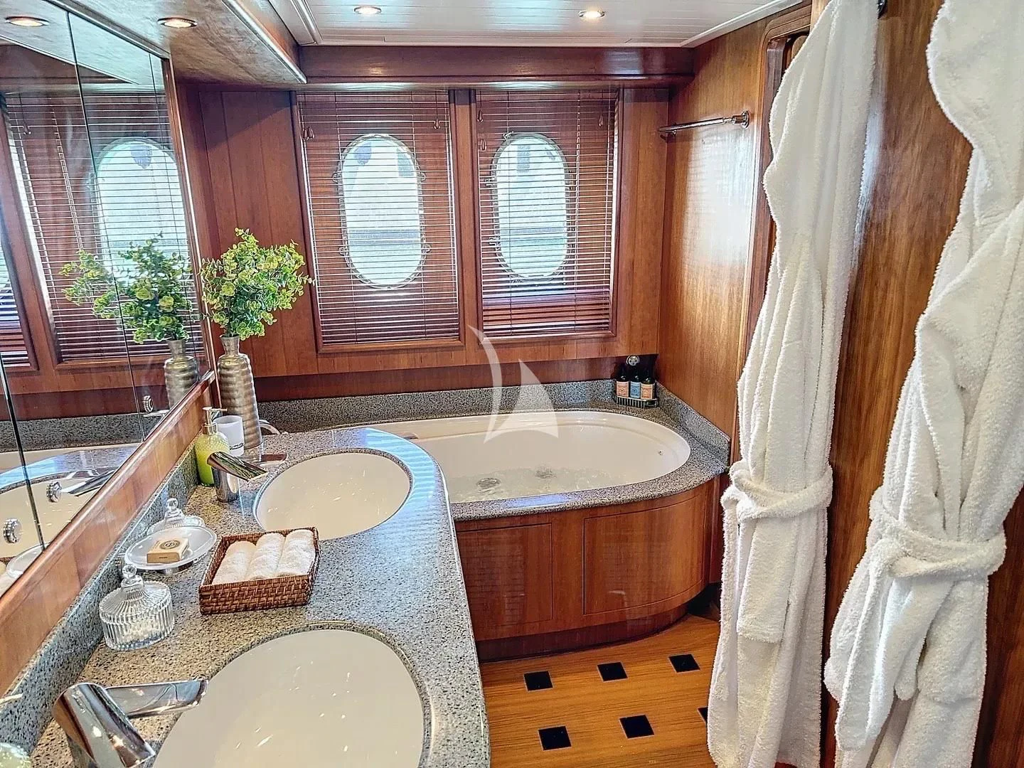 a bathroom with a large tub aboard FIGI Yacht for Sale