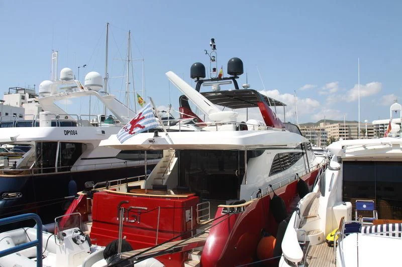 a boat is parked on the dock aboard FIGI Yacht for Sale