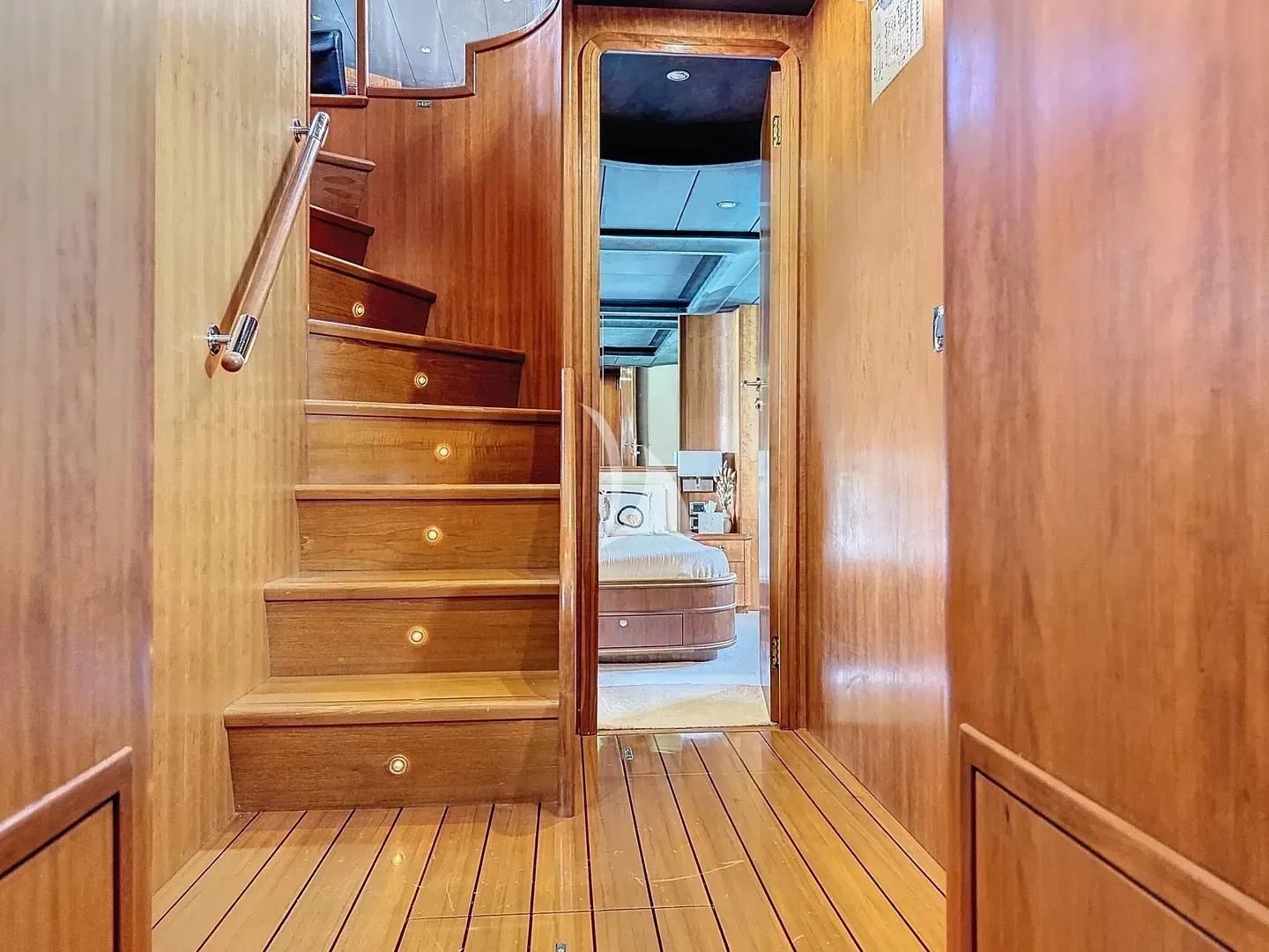 a wooden door leading to a bedroom aboard FIGI Yacht for Sale