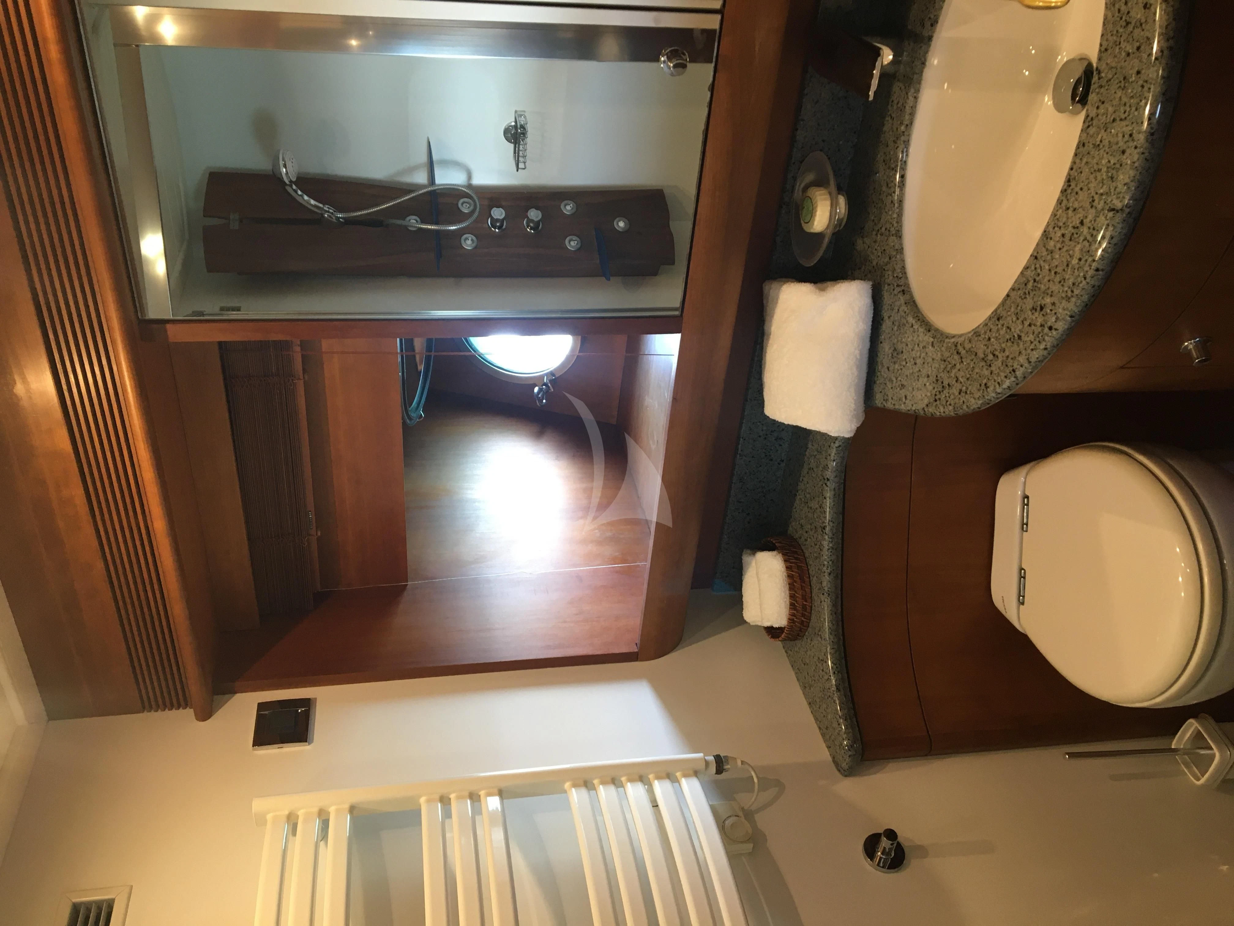 a bathroom with a sink and a toilet aboard FIGI Yacht for Sale