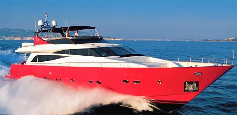 a white yacht on water aboard FIGI Yacht for Sale