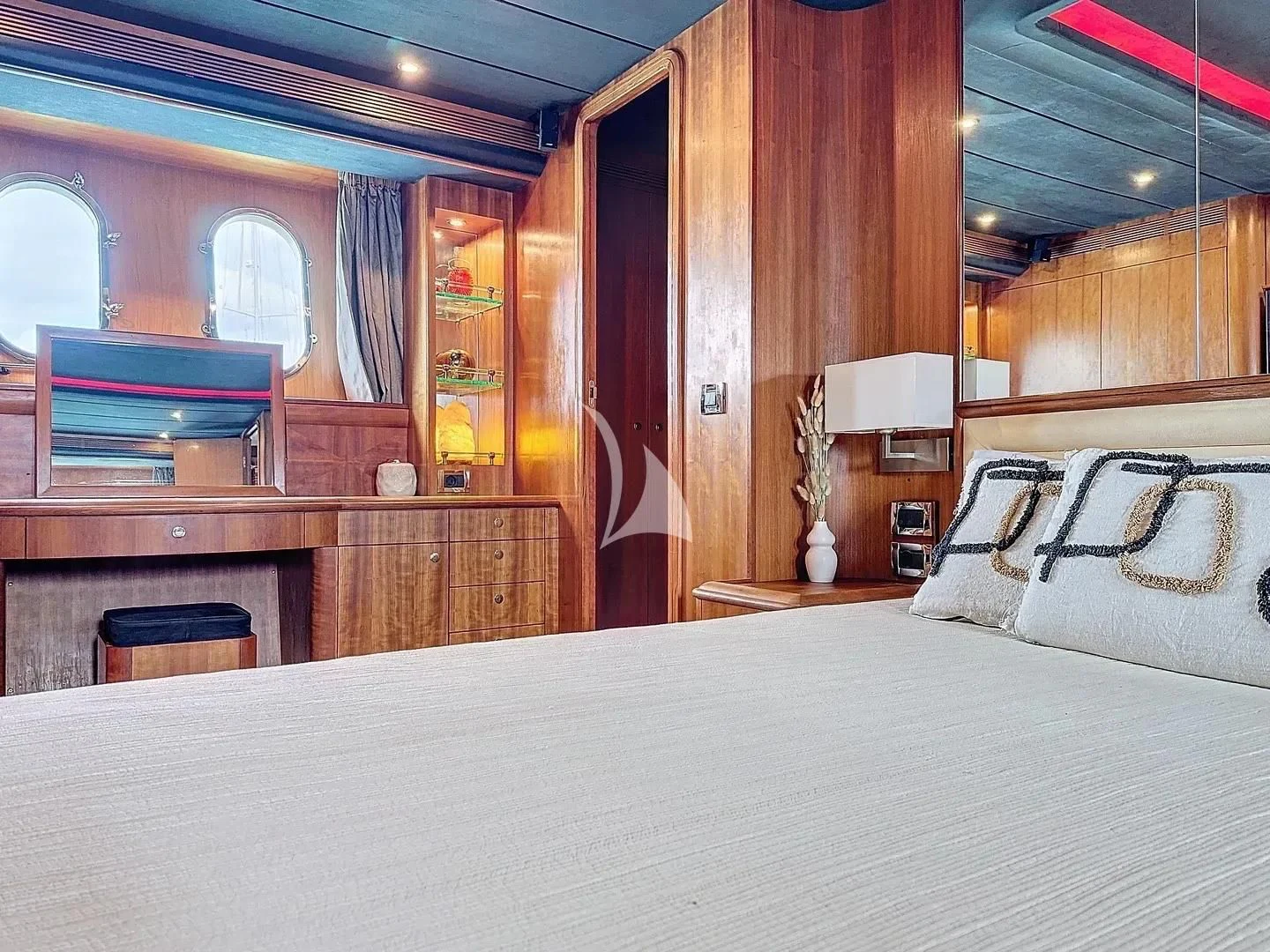 a bed in a room aboard FIGI Yacht for Sale