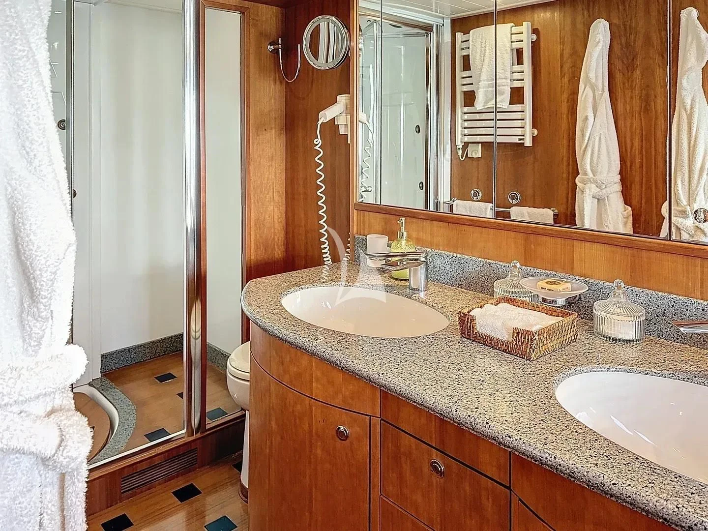 a bathroom with a large mirror aboard FIGI Yacht for Sale