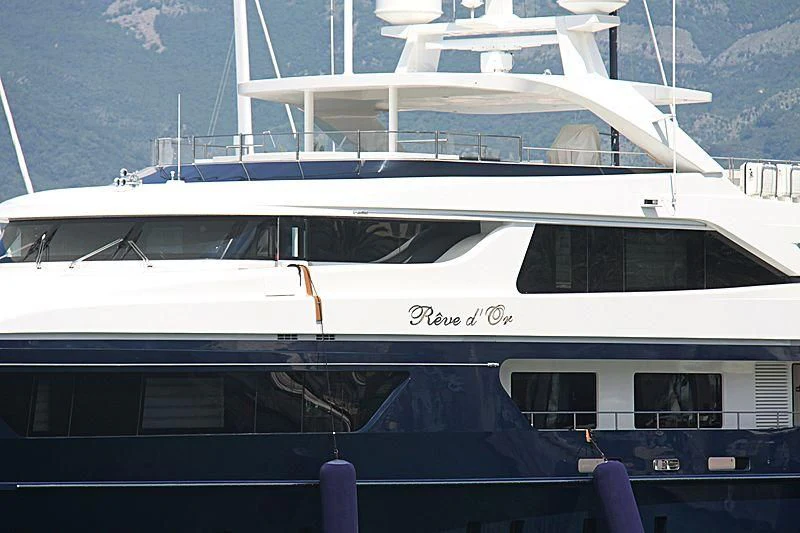 a white yacht on the water aboard REVE D'OR Yacht for Sale