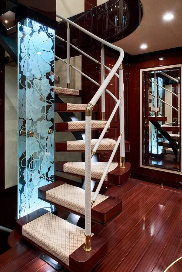 a staircase in a room aboard REVE D'OR Yacht for Sale