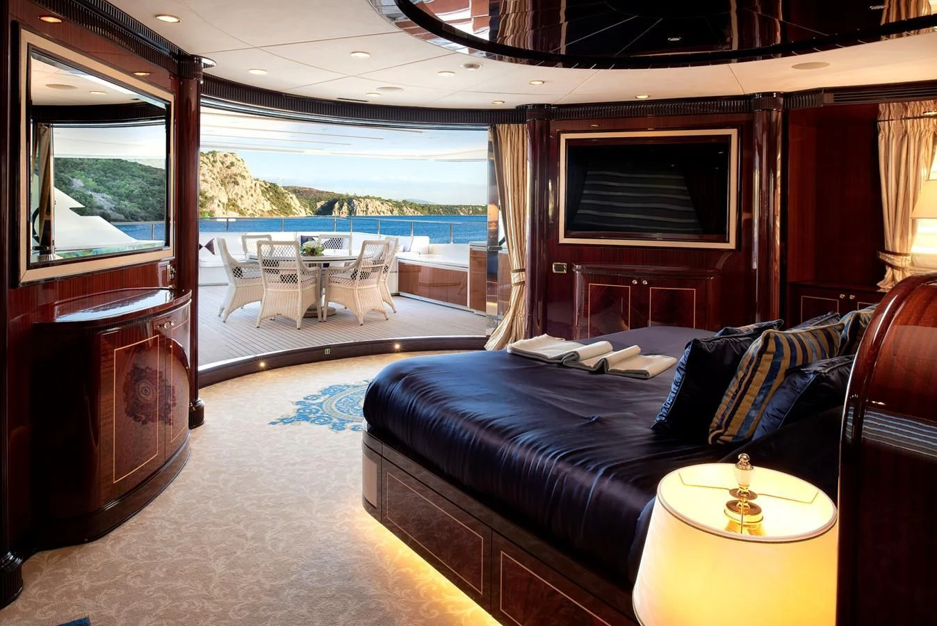 a living room with a large balcony aboard REVE D'OR Yacht for Sale