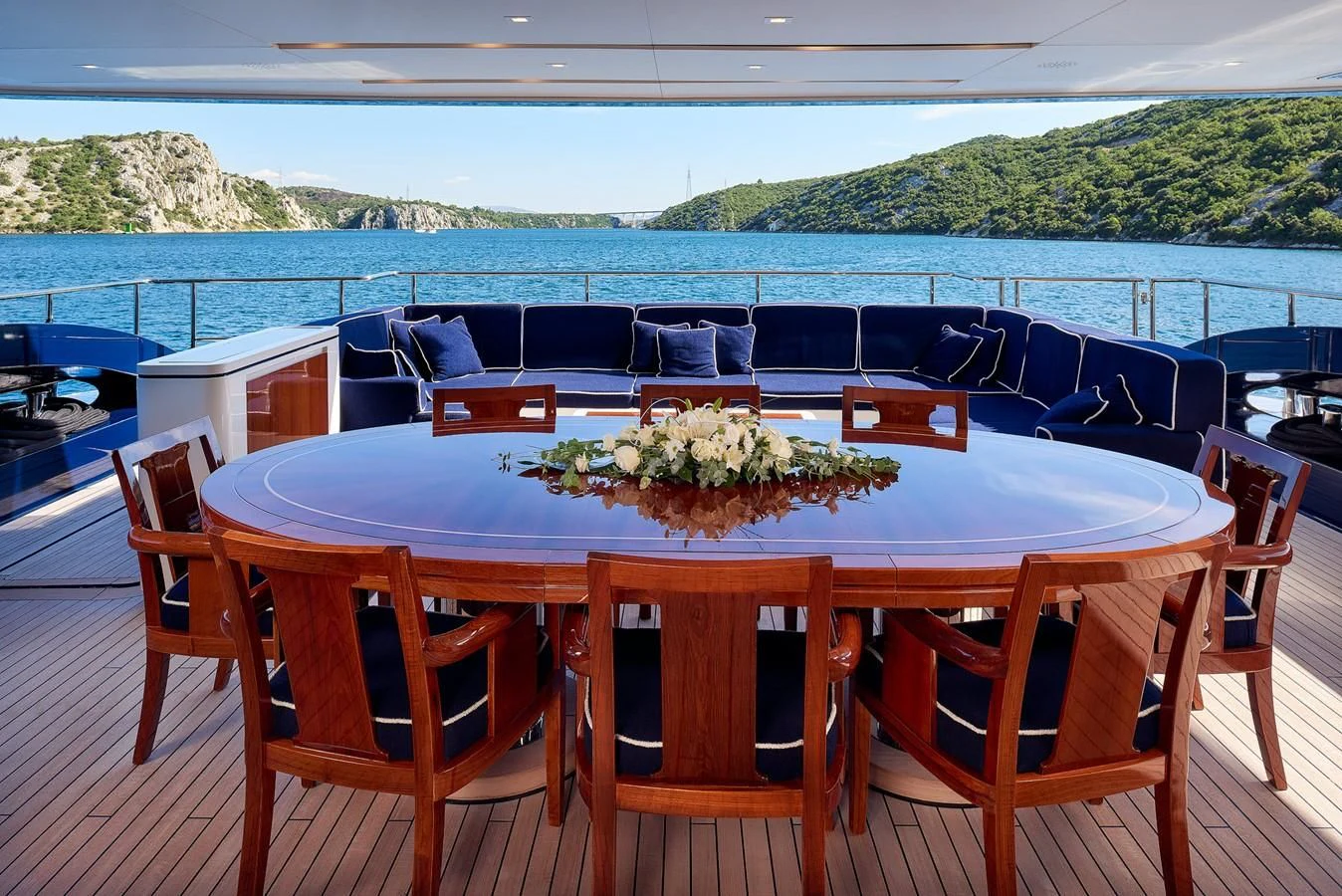 a table with a plant on top of it aboard REVE D'OR Yacht for Sale