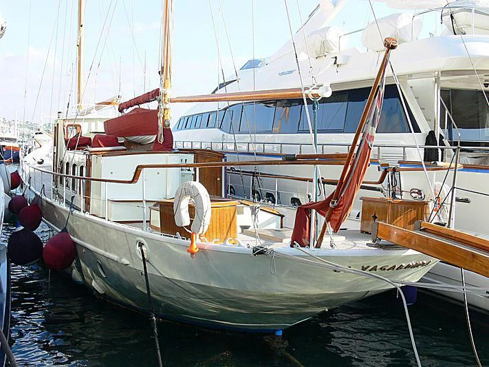 a boat docked in a harbor aboard LA VAGABUNDA Yacht for Sale