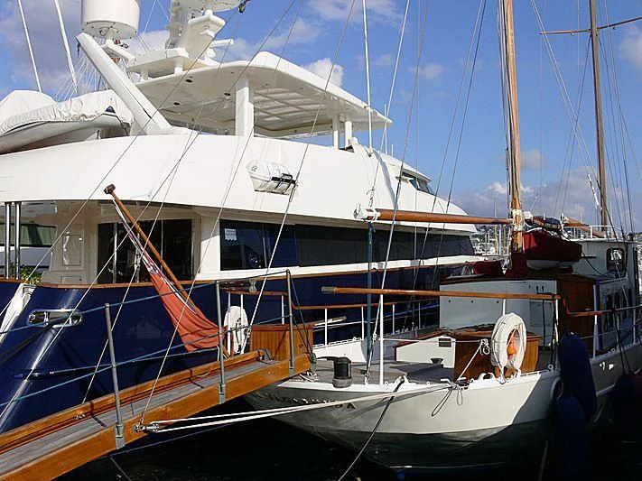 a boat docked at a pier aboard LA VAGABUNDA Yacht for Sale