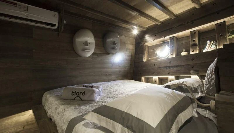 a room with beds and a satellite dish aboard TIARE Yacht for Sale