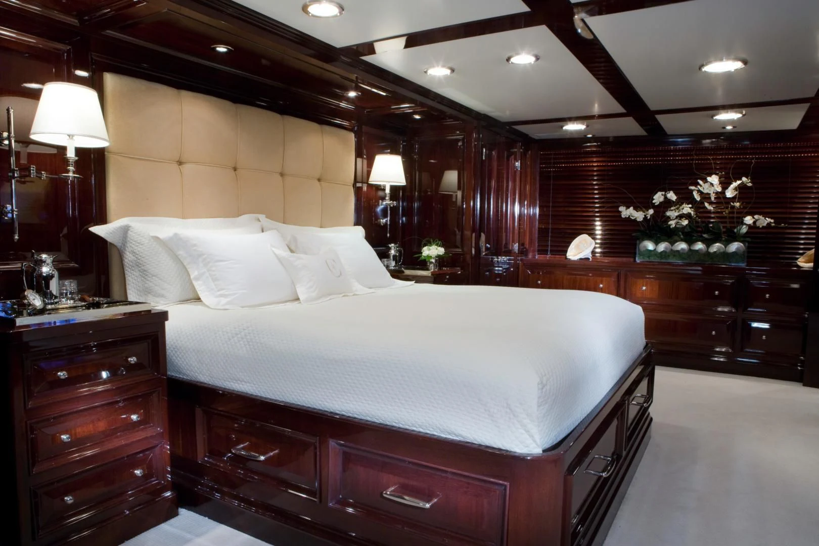 a large bed in a hotel room aboard EXPLORA Yacht for Sale