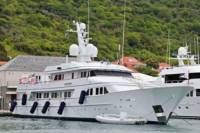 a large white boat in the water aboard EXPLORA Yacht for Sale