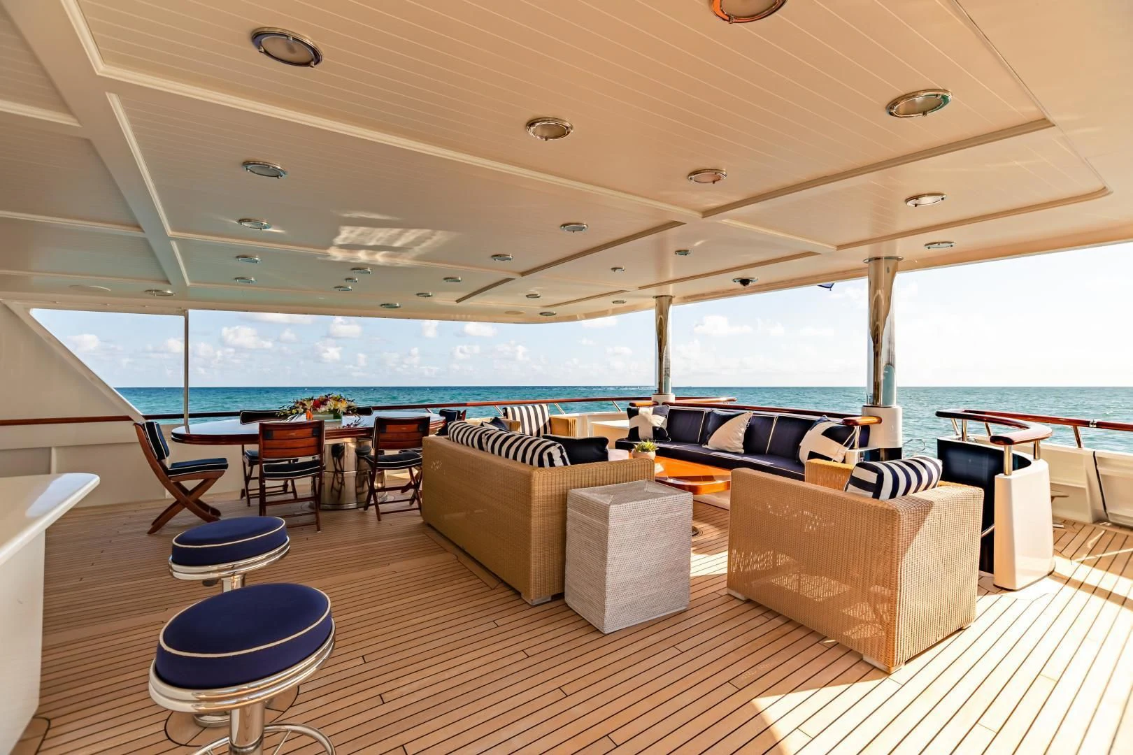 a living room with a large window aboard EXPLORA Yacht for Sale