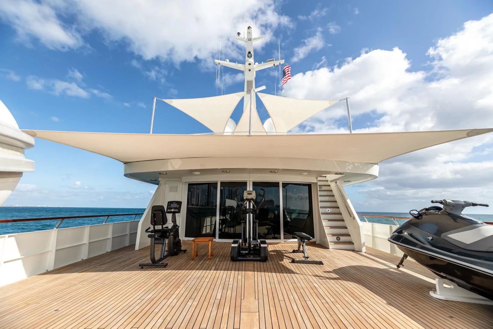 a large white ship docked aboard EXPLORA Yacht for Sale
