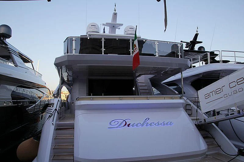 a couple of boats on a dock aboard DUCHESSA Yacht for Sale
