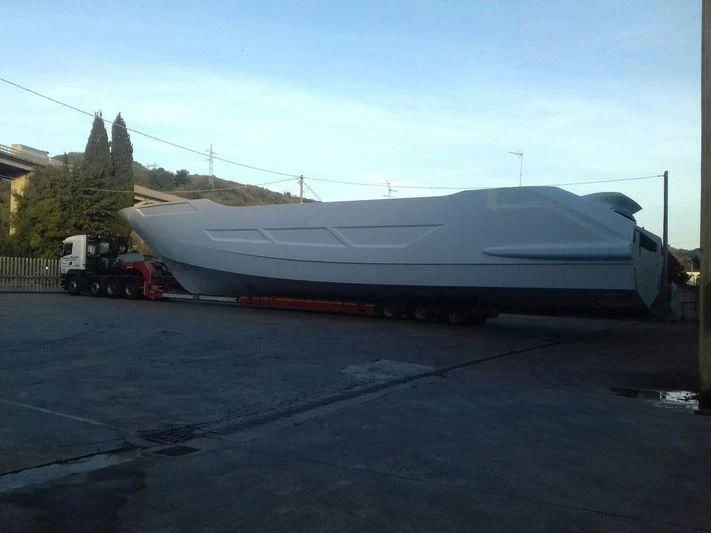 a white boat on a trailer aboard DUCHESSA Yacht for Sale