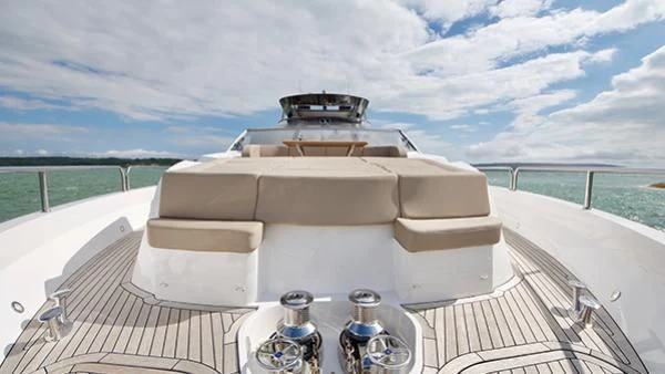 a white boat on a deck aboard DUCHESSA Yacht for Sale