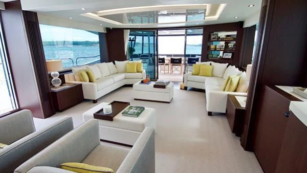 a living room with a large window aboard DUCHESSA Yacht for Sale