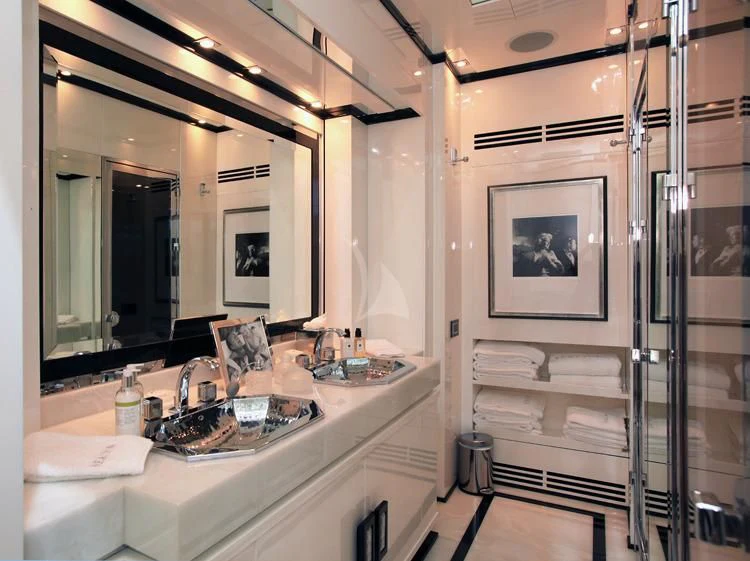 a bathroom with a large mirror aboard SEALYON Yacht for Sale