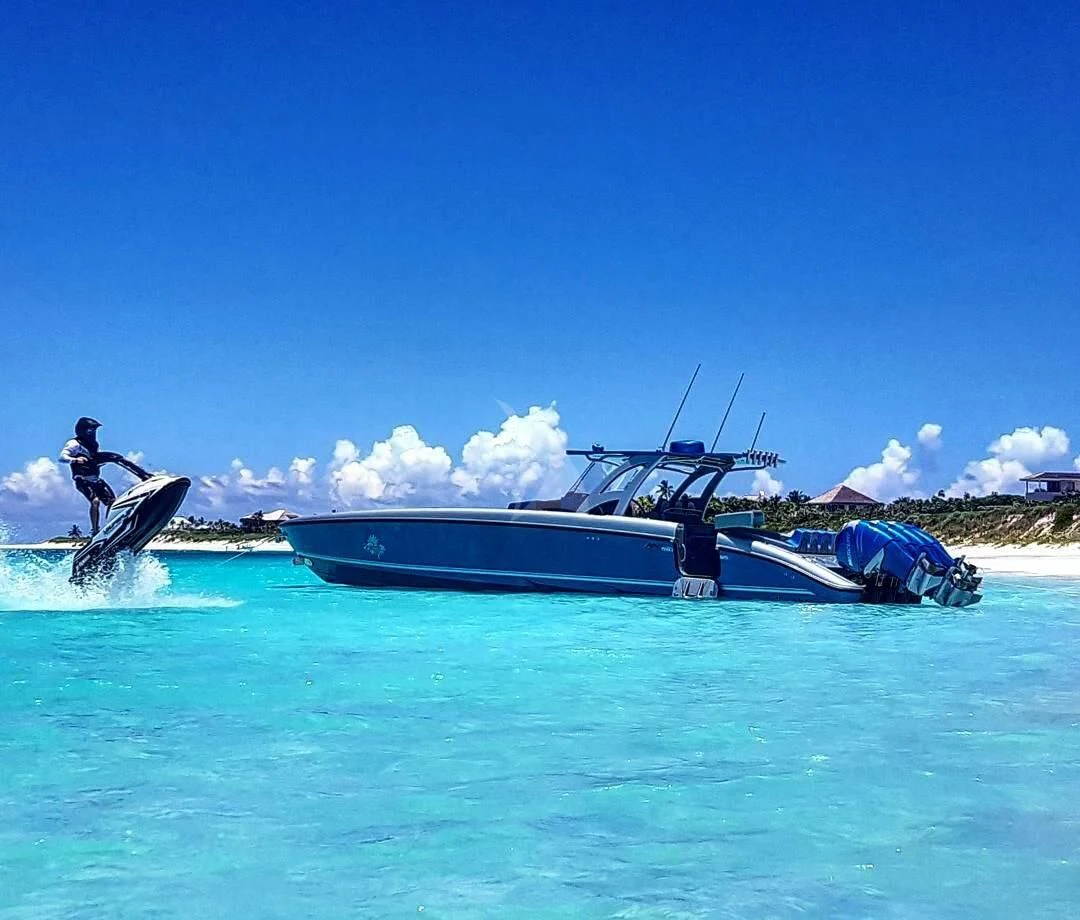 a man jumping off a boat aboard SEALYON Yacht for Sale
