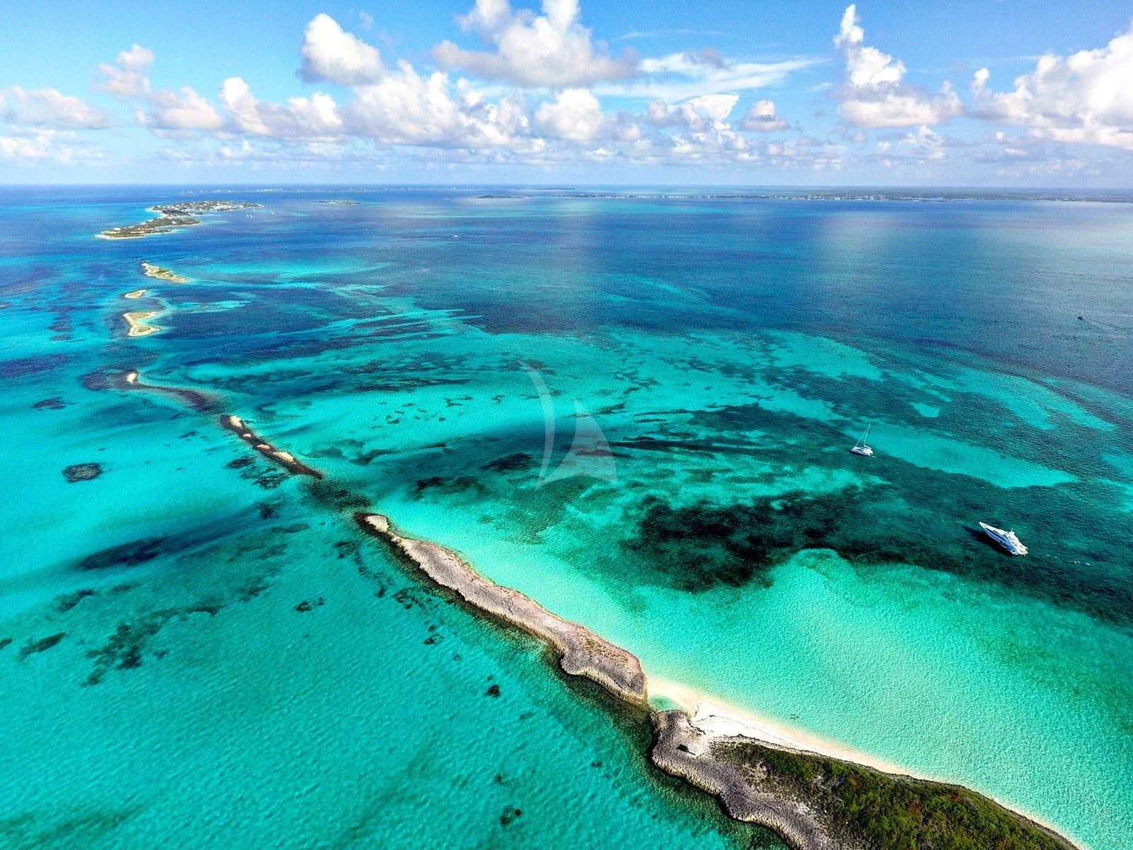 an aerial view of a body of water with land and clouds aboard SEALYON Yacht for Sale