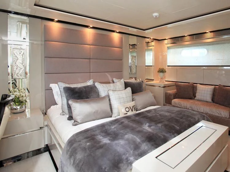 a living room with a couch and a table aboard SEALYON Yacht for Sale