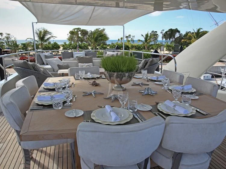 a table set for a dinner aboard SEALYON Yacht for Sale