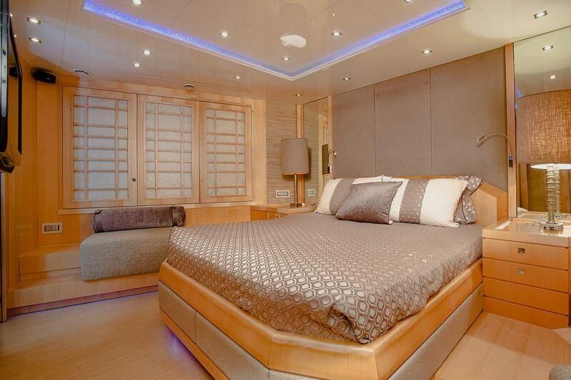 a large bed in a hotel room aboard ARION TERCERO Yacht for Sale