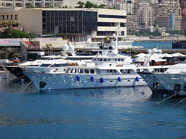a couple of boats are parked in the water aboard ESPADARTE Yacht for Sale
