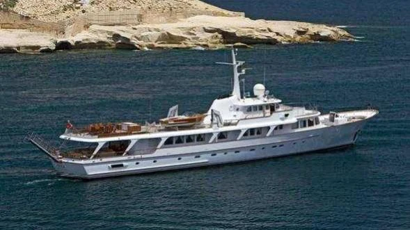 a white yacht in the water aboard ESPADARTE Yacht for Sale