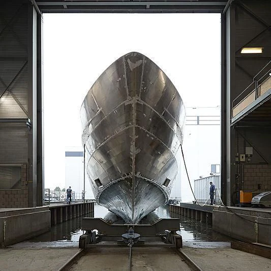 a large metal object in a factory aboard AQUAMARINE X Yacht for Sale