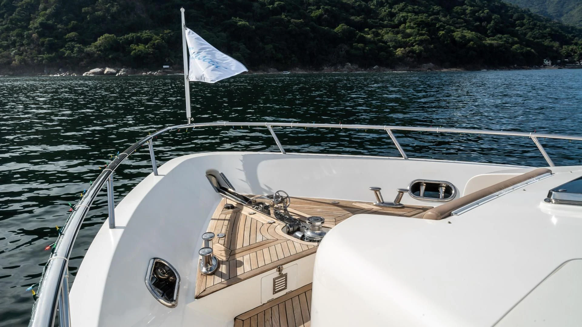 a boat on the water aboard FULL HOUSE Yacht for Sale
