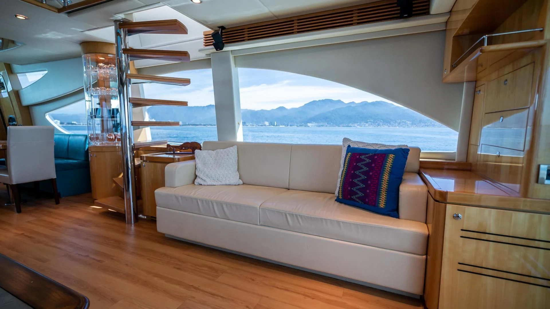 a living room with a large window aboard FULL HOUSE Yacht for Sale