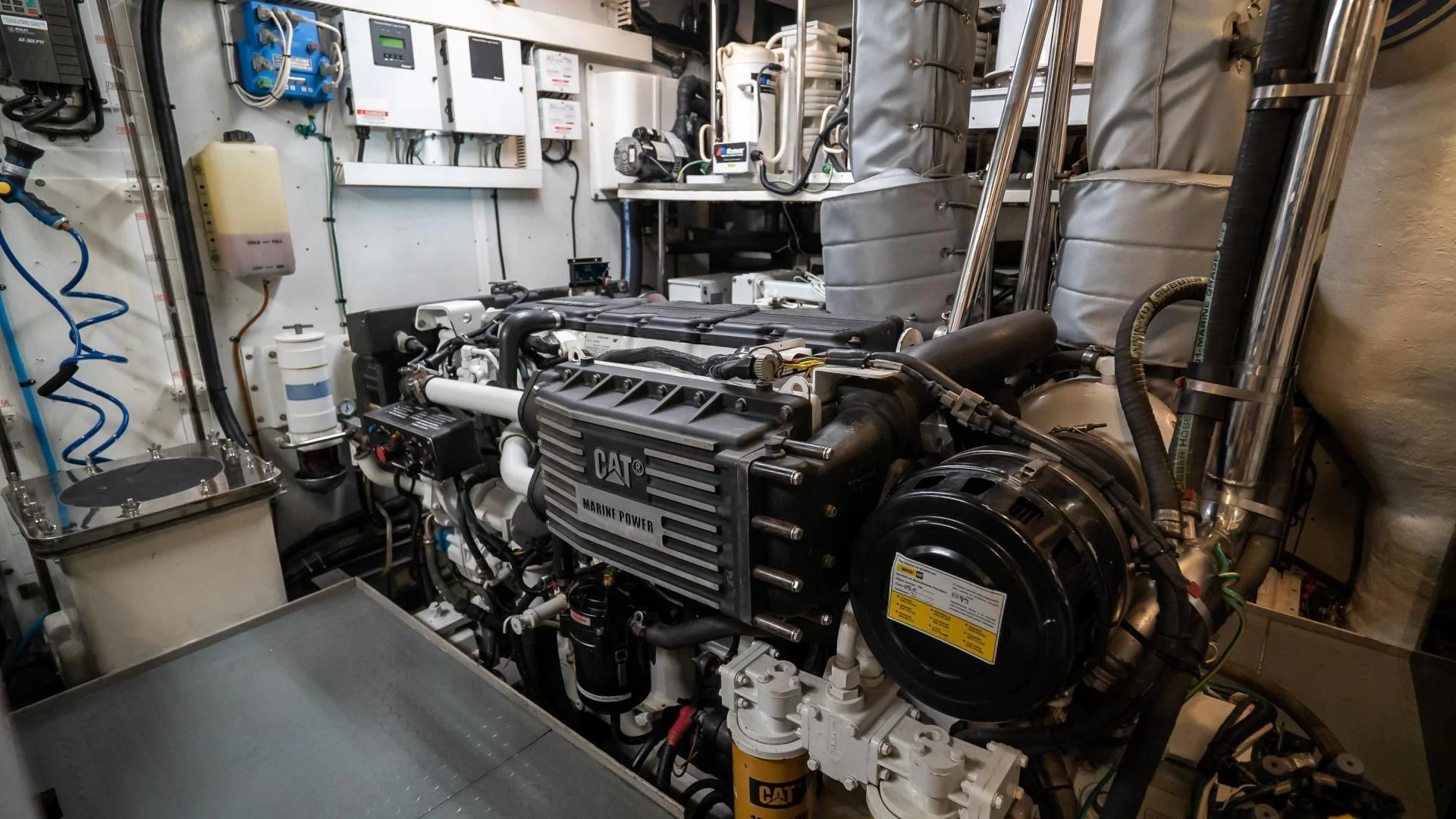 a machine with a large metal cylinder aboard FULL HOUSE Yacht for Sale