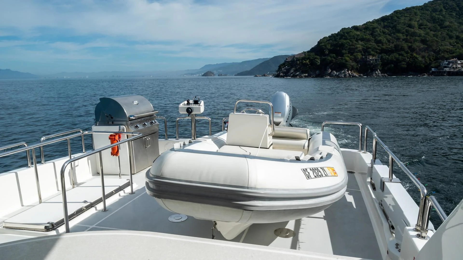 a boat on the water aboard FULL HOUSE Yacht for Sale