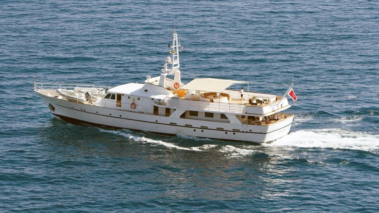 a large white boat aboard SHAHA Yacht for Sale