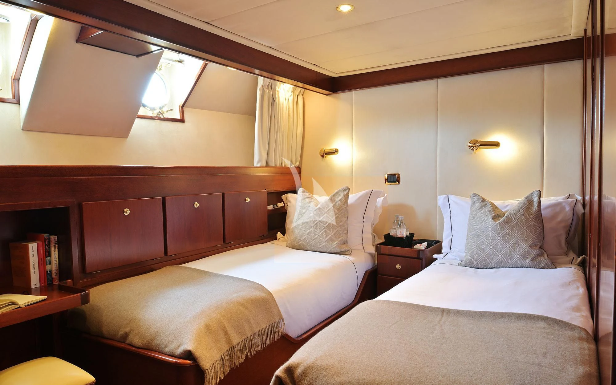 a room with two beds aboard SHAHA Yacht for Sale