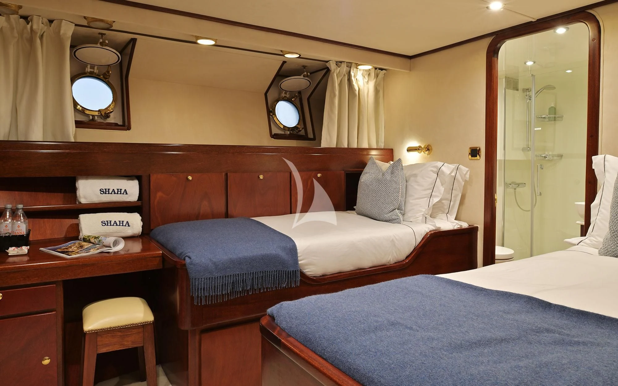 a room with two beds aboard SHAHA Yacht for Sale