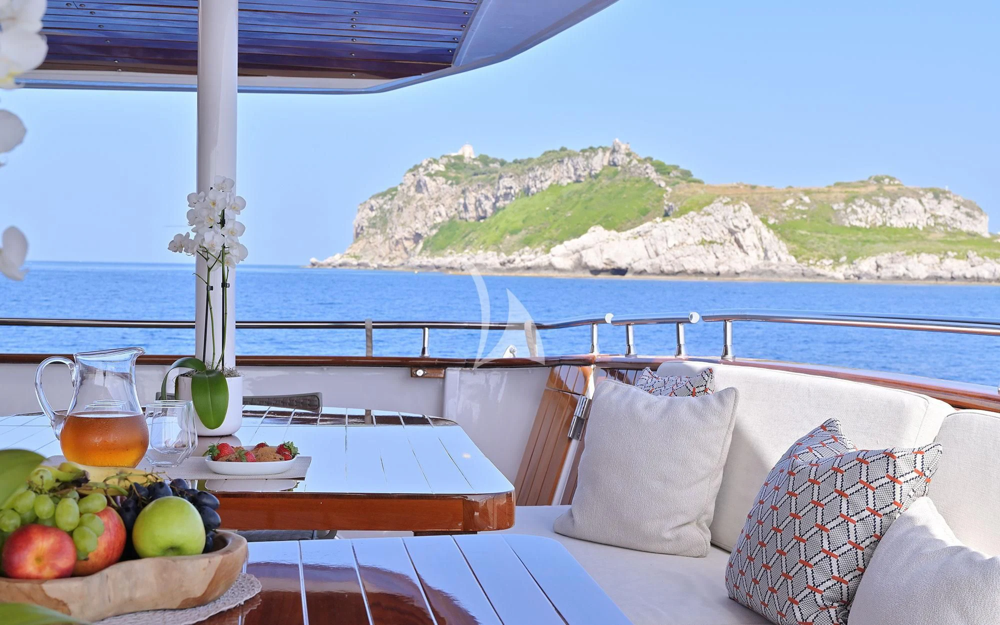 a table with fruit on it aboard SHAHA Yacht for Sale