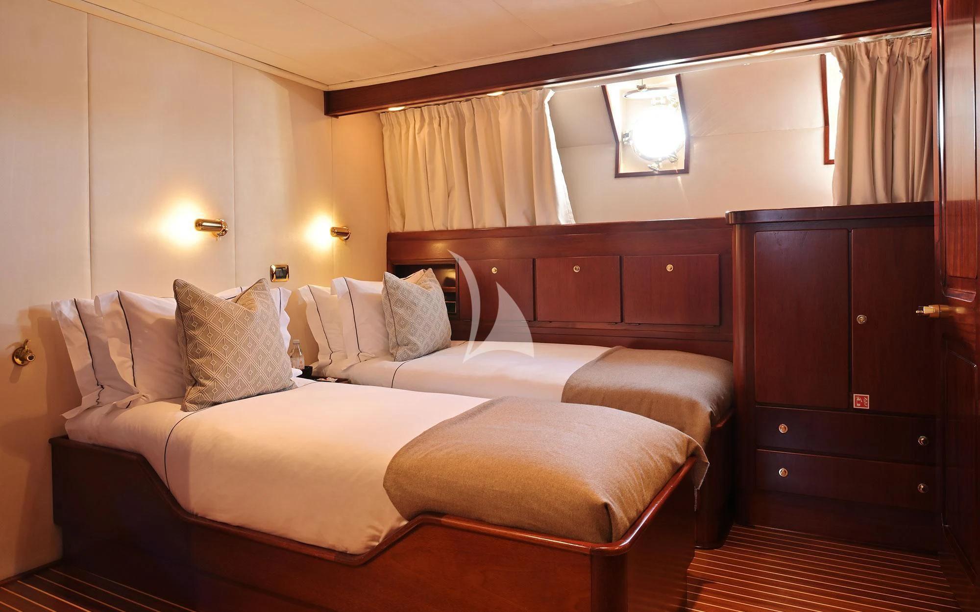 a bed in a room aboard SHAHA Yacht for Sale
