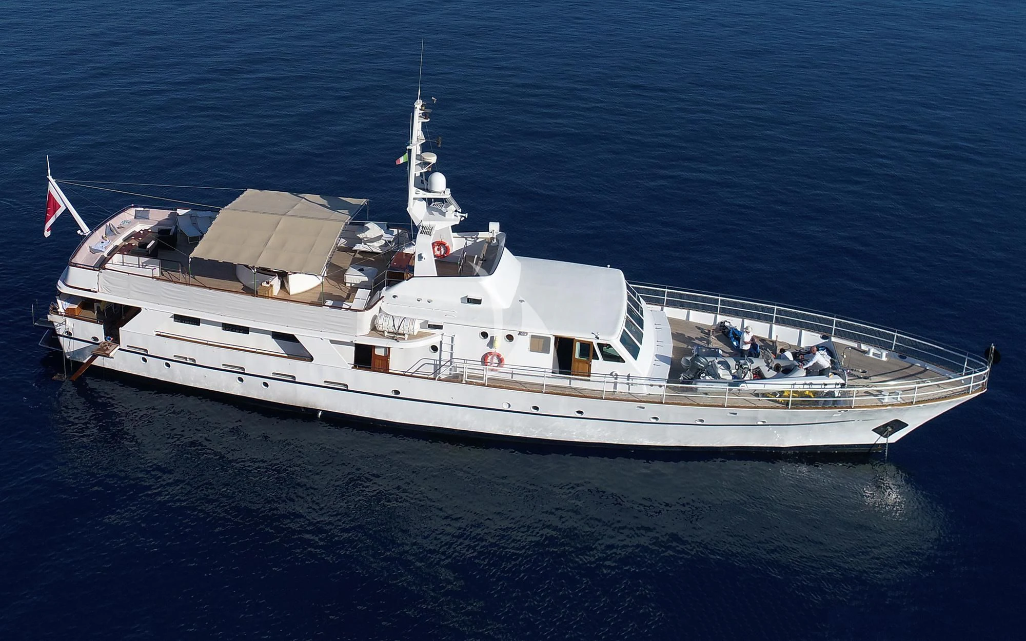 a large ship in the water aboard SHAHA Yacht for Sale