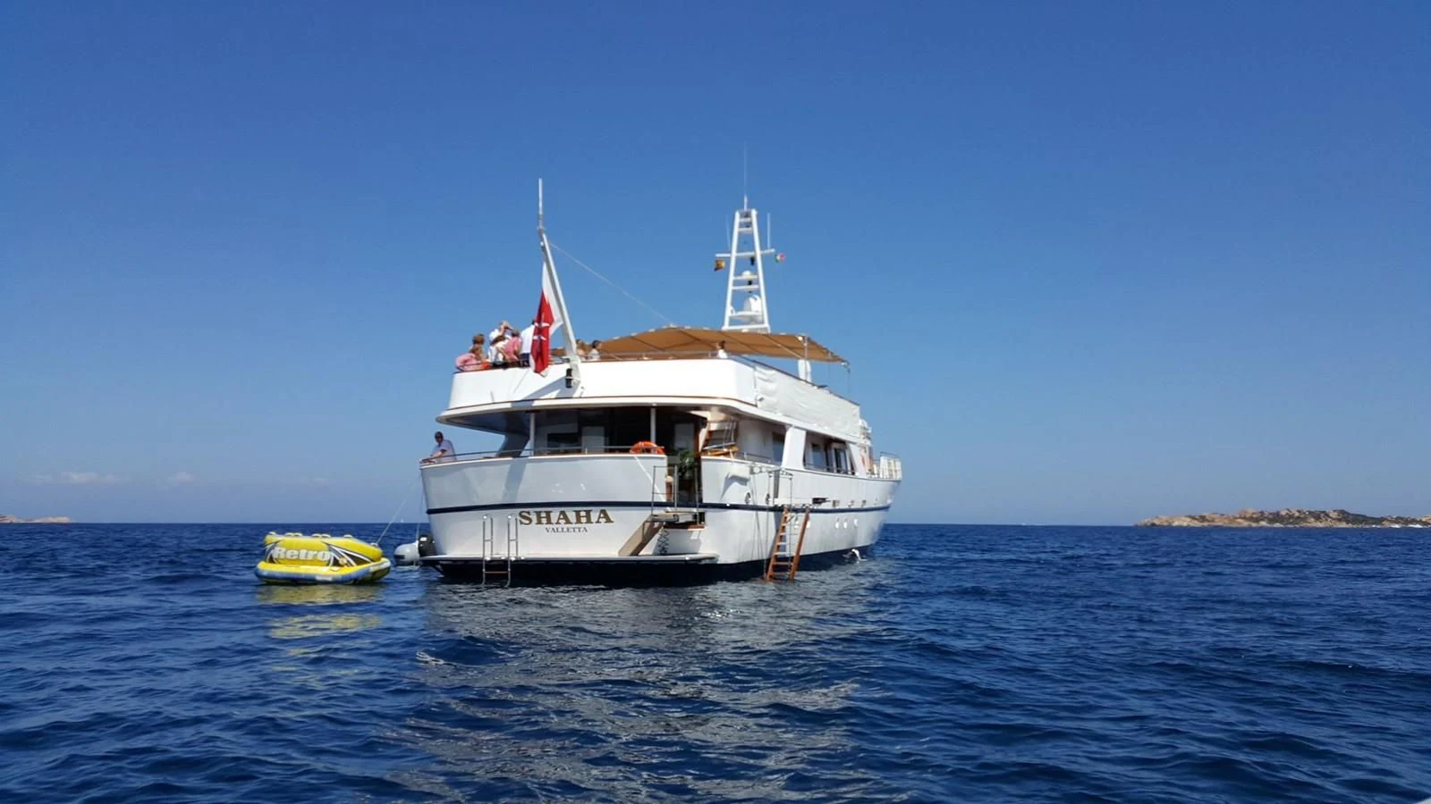 a boat on the water aboard SHAHA Yacht for Sale