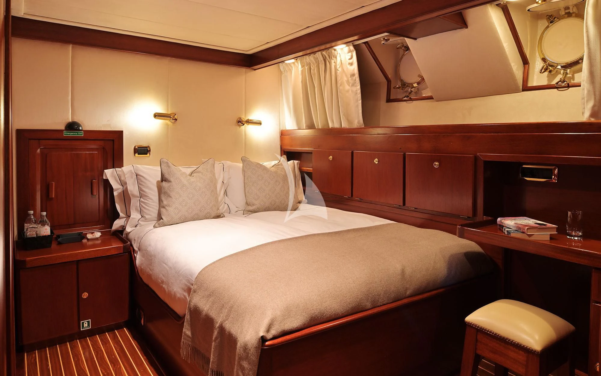 a bed in a room aboard SHAHA Yacht for Sale