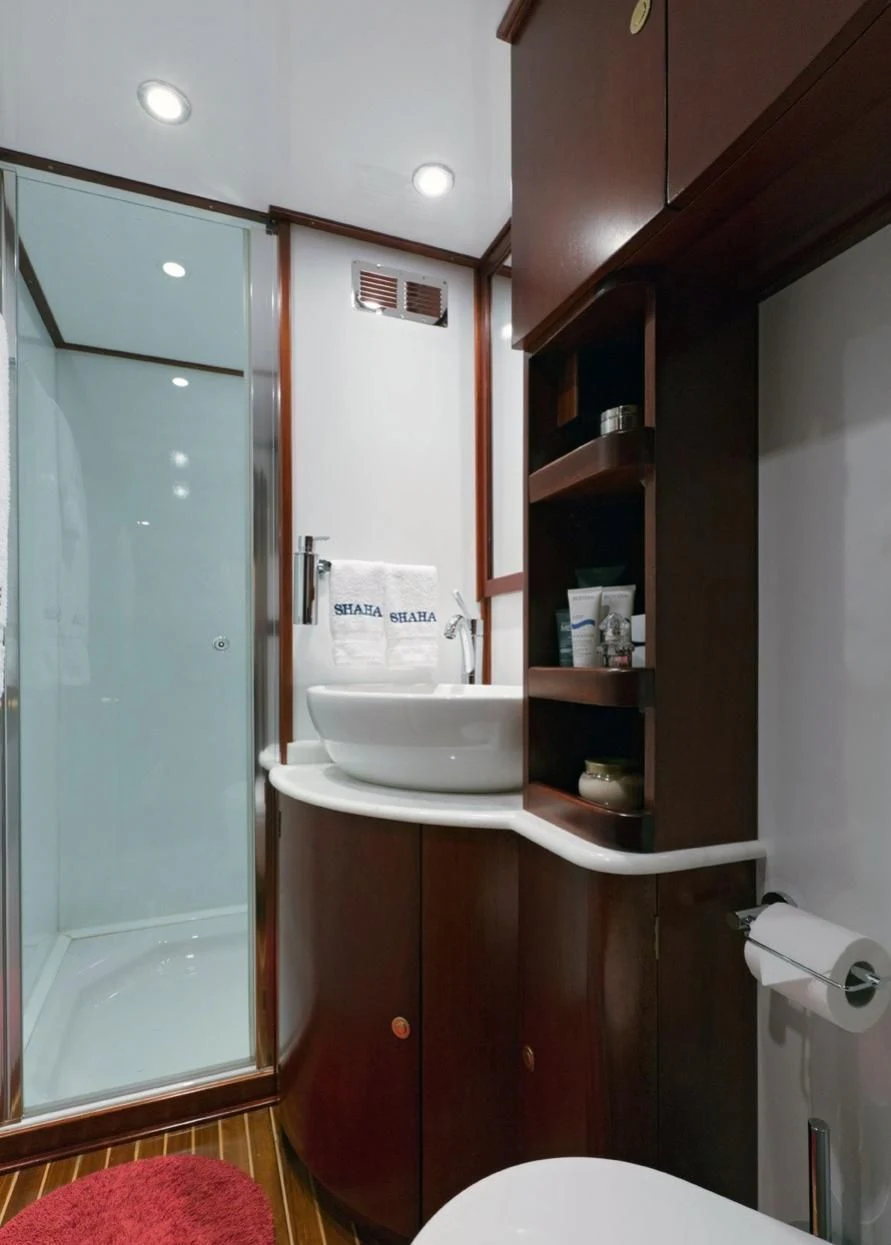 a bathroom with a sink and a toilet aboard SHAHA Yacht for Sale