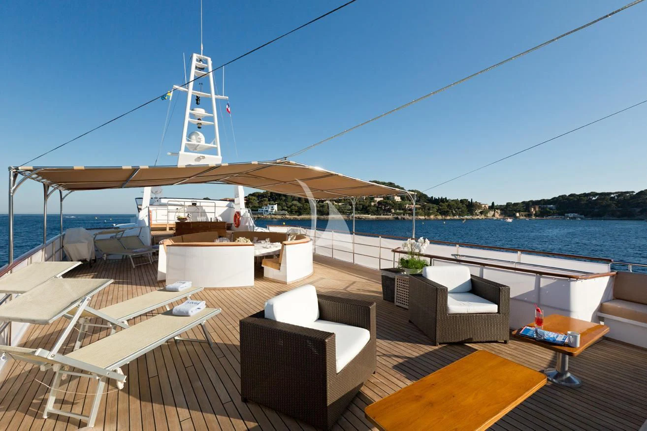 a deck with a view of a body of water and a large tower aboard SHAHA Yacht for Sale