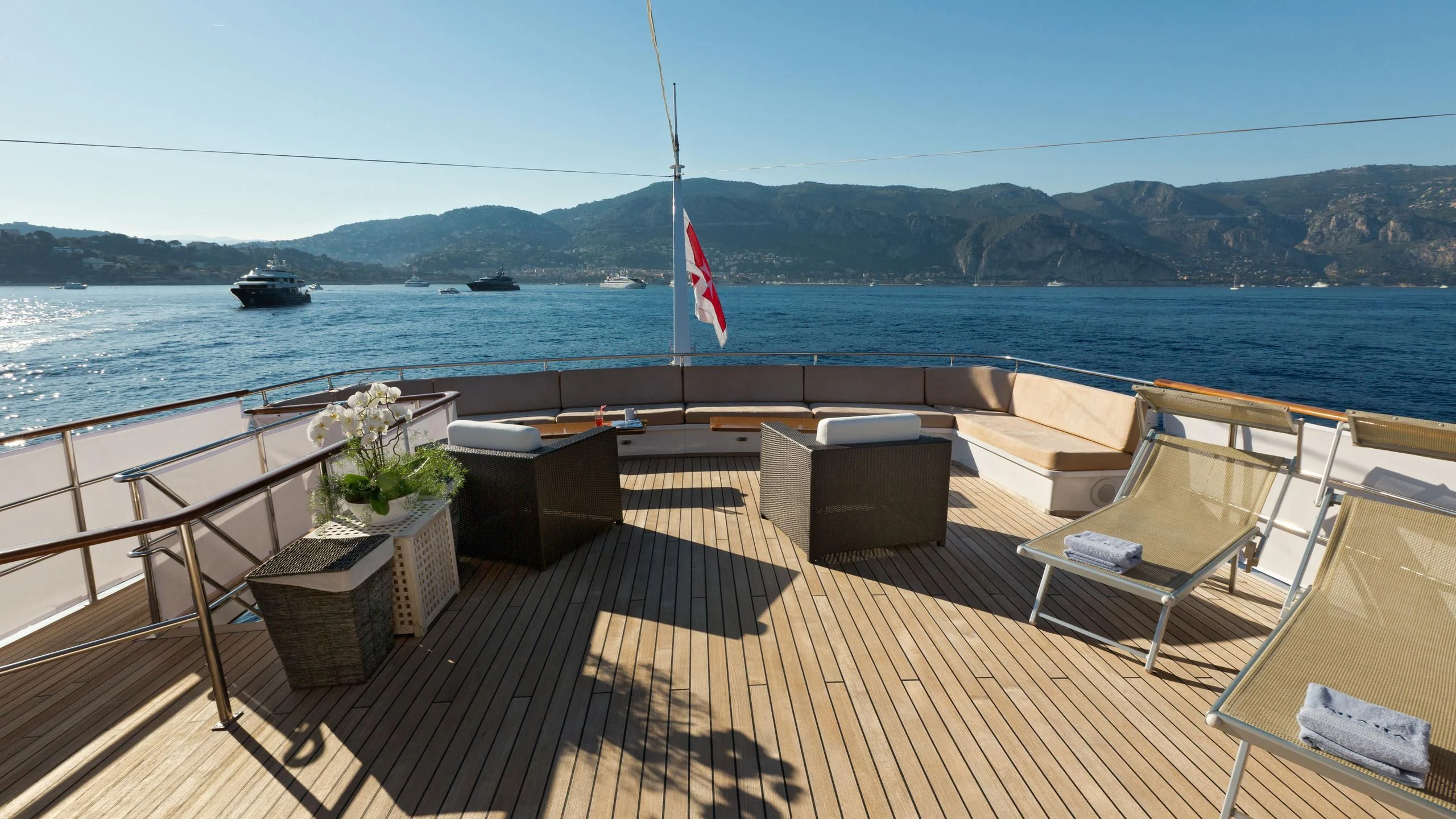 a deck overlooking a body of water aboard SHAHA Yacht for Sale