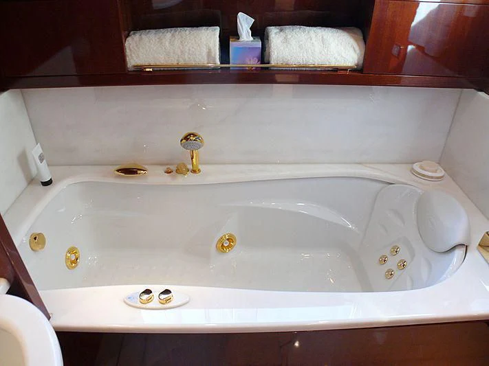 a bathroom sink with a mirror above it aboard ARGO B Yacht for Sale