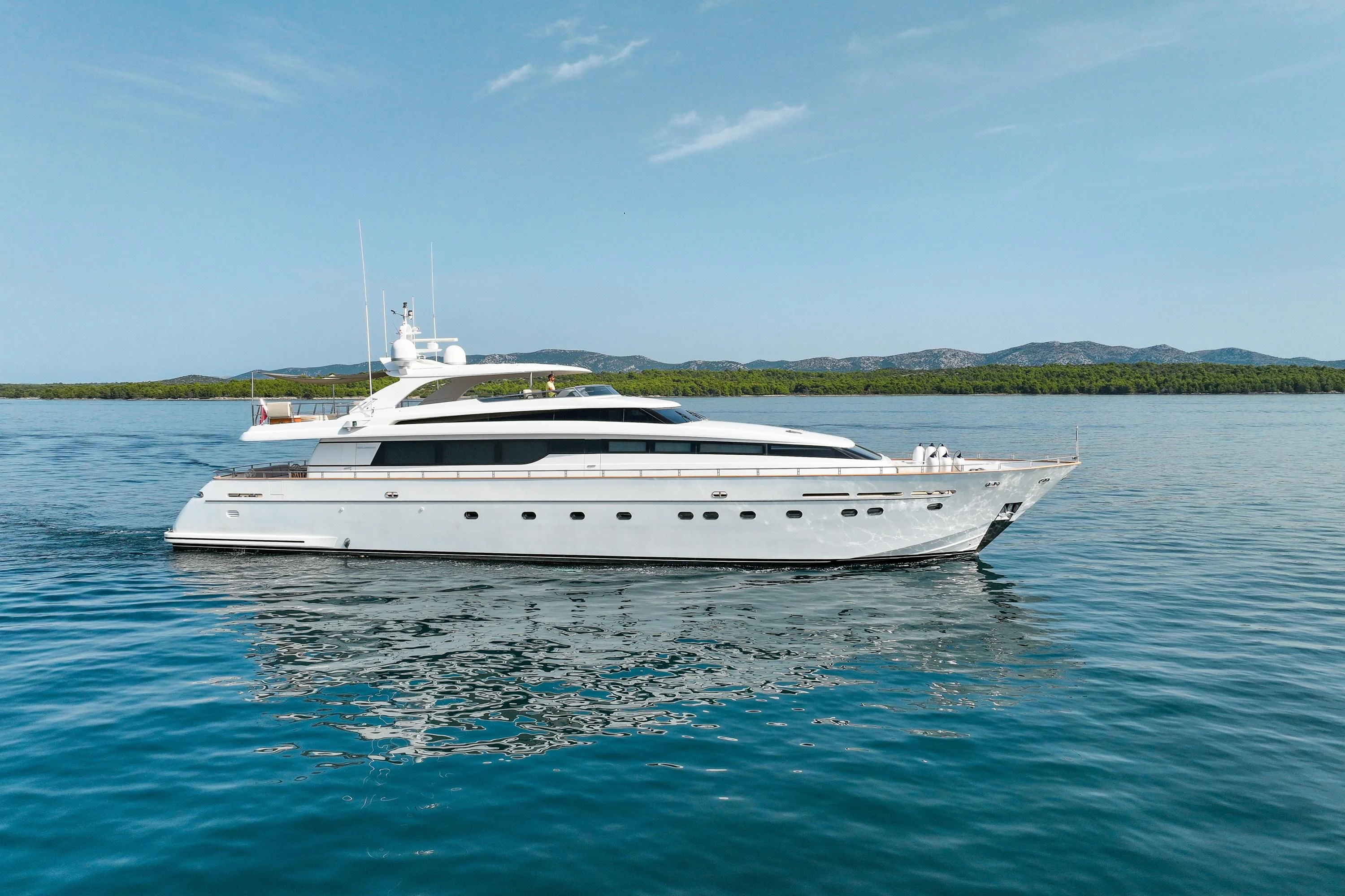 a white boat in the water aboard ARGO B Yacht for Sale